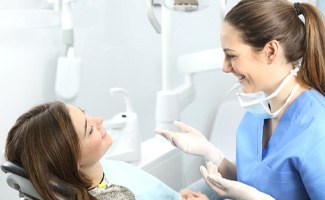 Dentist and patient discussing cost of root canal in Ocala