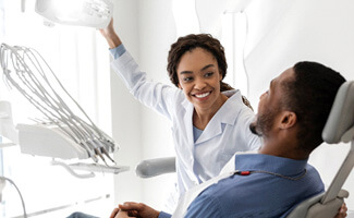 patient getting teeth whitening