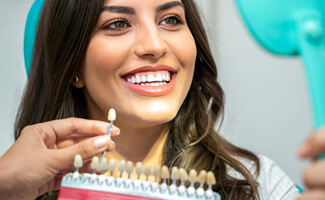 patient getting teeth whitening