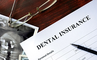 Dental insurance form lying on a table