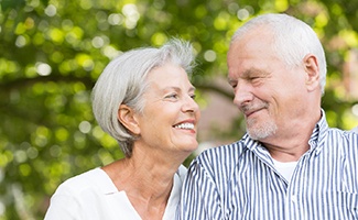 older couple smiling at each other