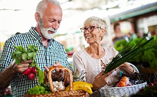 older couple shopping for healthy food together