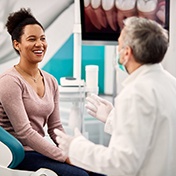 A woman listening to her dentist in Ocala
