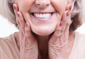 Should I get dentures or dental implants in Ocala, FL?