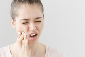 woman with mouth pain