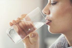 woman sipping water