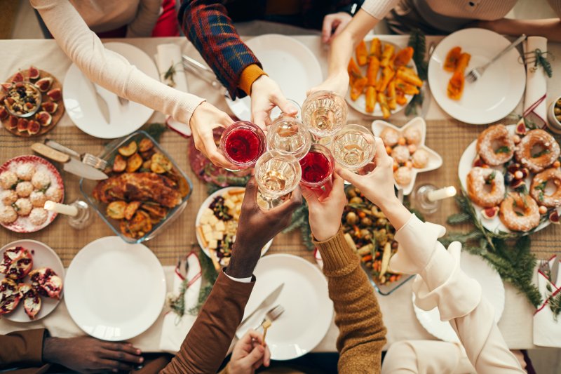 A group of people enjoying holiday dinner.