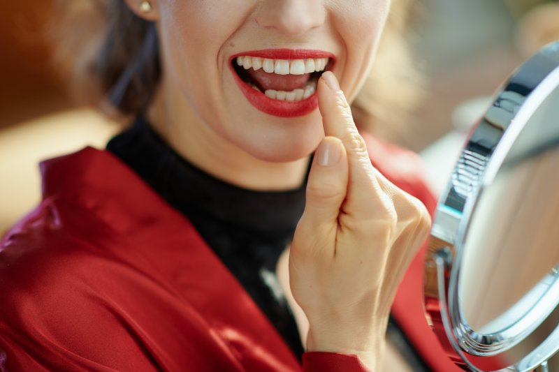 Patient smiling after teeth whitening