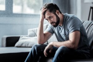Man experiencing an unwanted thought