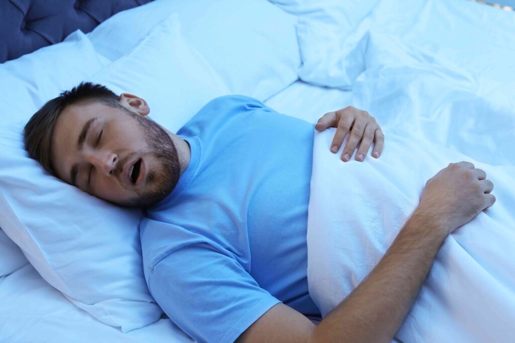 Man sleeping with his mouth open