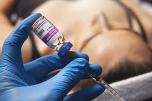 Dentist filling syringe with BOTOX.